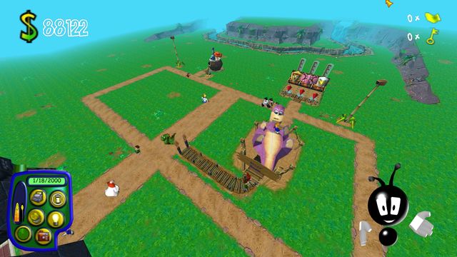 A Lost Kingdom park with guests walking its paths, a ride and the control panel.